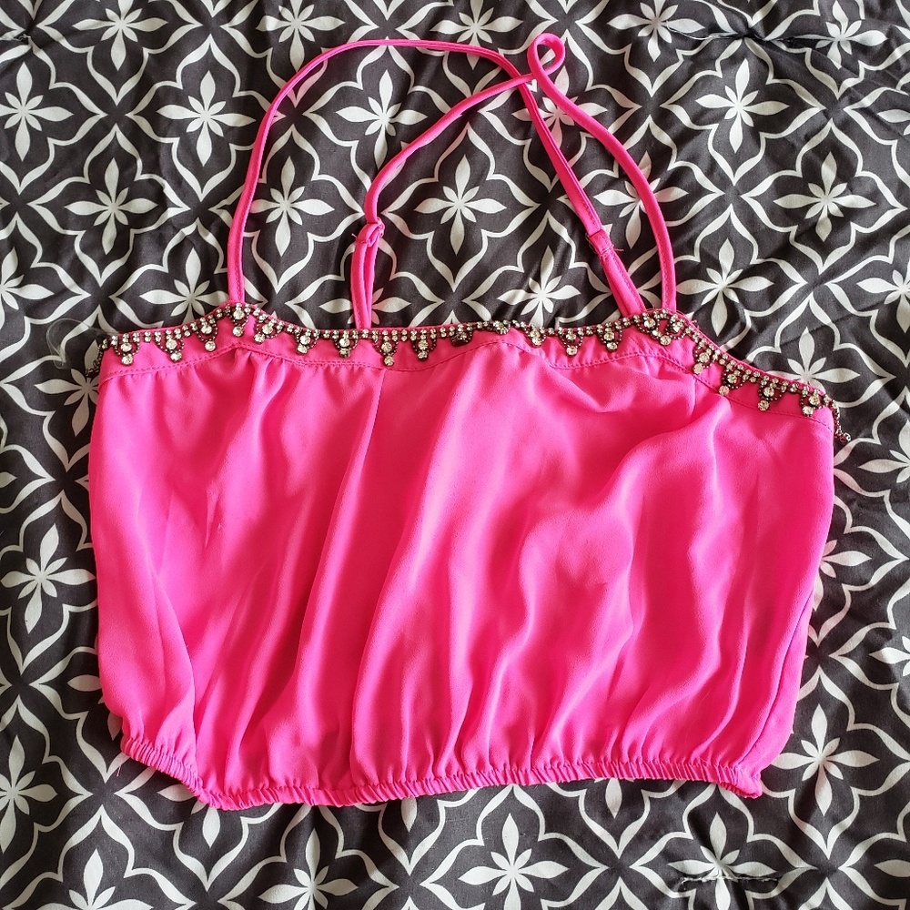 Hot pink crop top with jewels.